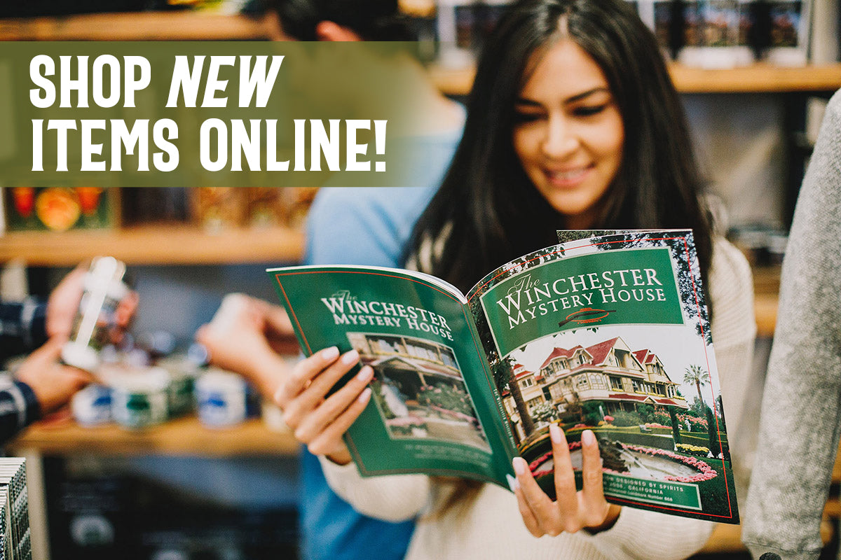 guest reading the official winchester mystery house souvenir book